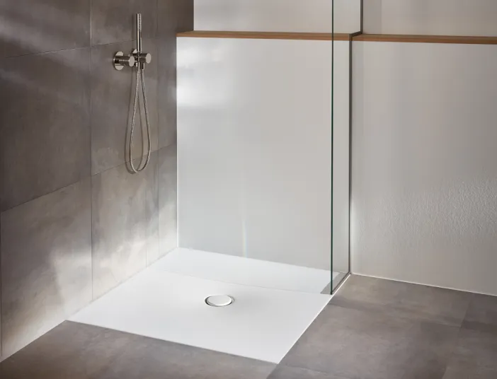 Duschfläche BetteFloor in Dusche mit Natursteinfließen